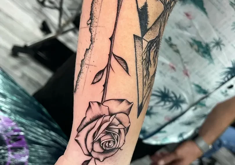 fine line flower tattoo sleeve