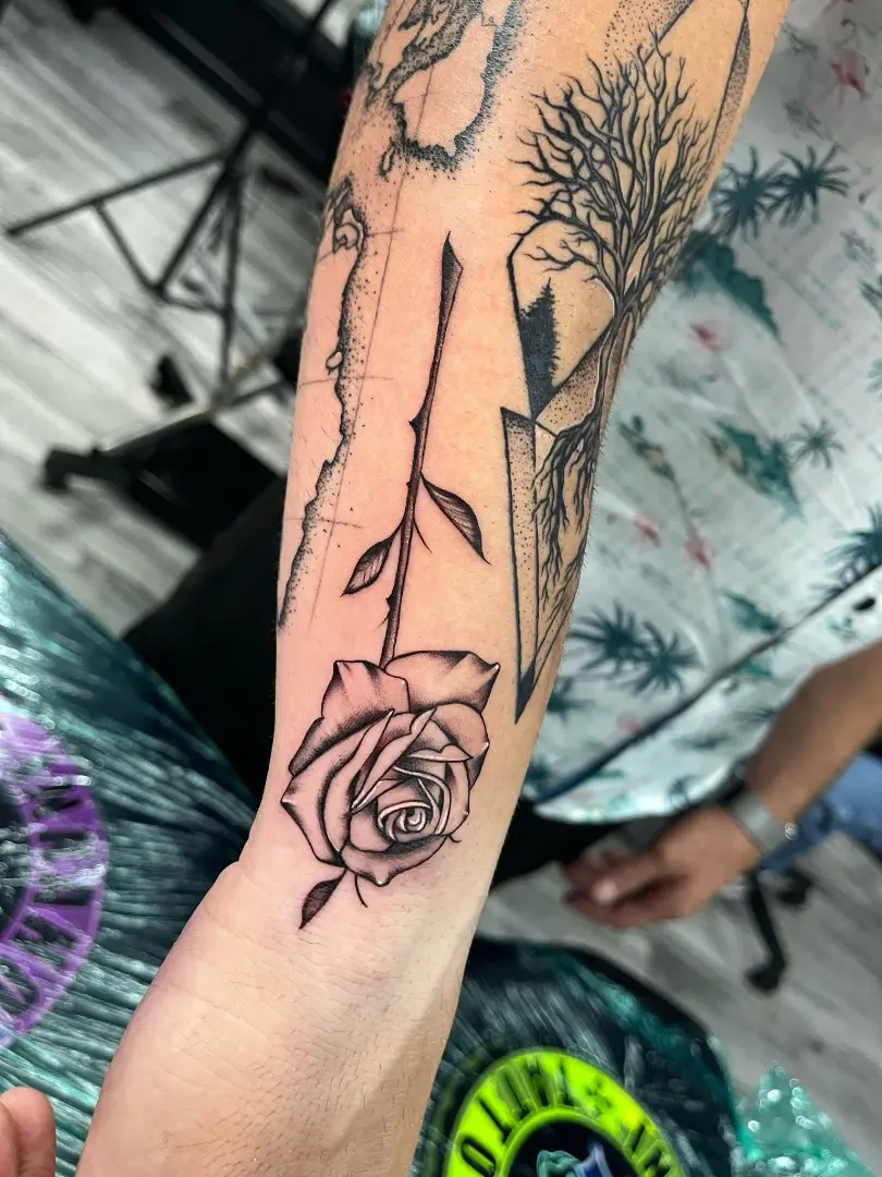 fine line flower tattoo sleeve