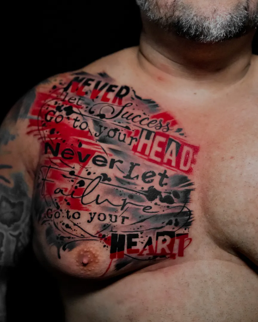 Trash Polka style chest tattoo